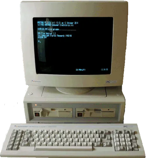 An Amstrad PC1512: monitor, base unit with two floppy drives and keyboard